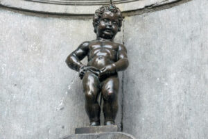 Manneken Pis is small bronze sculpture (61 cm) depicting a naked little boy urinating into a fountain's basin. It was designed by Hieronymus Duquesnoy the Elder and put in place in 1618, in Brussels, Belgium